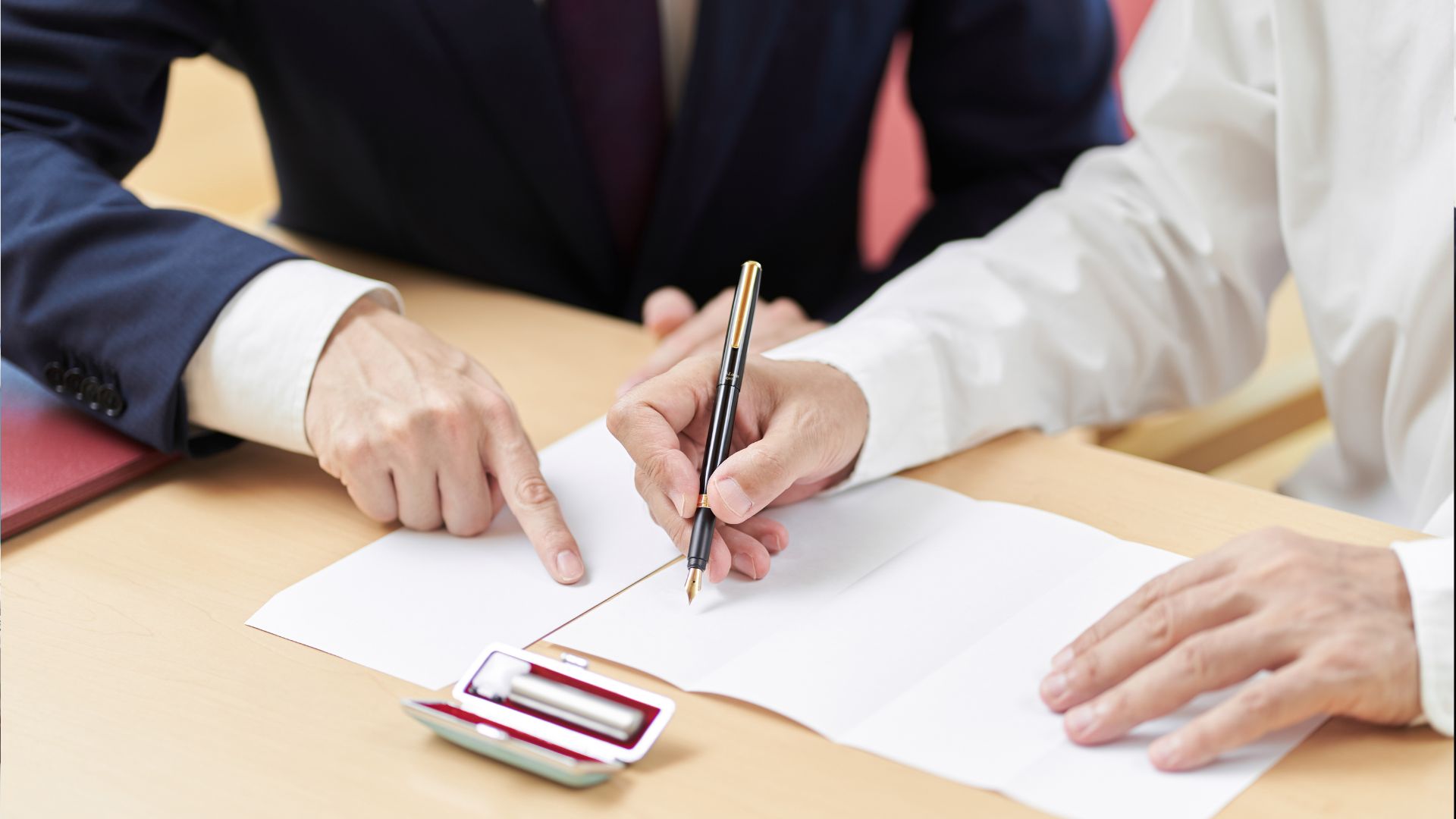 Signing Inheritance Papers with Lawyer