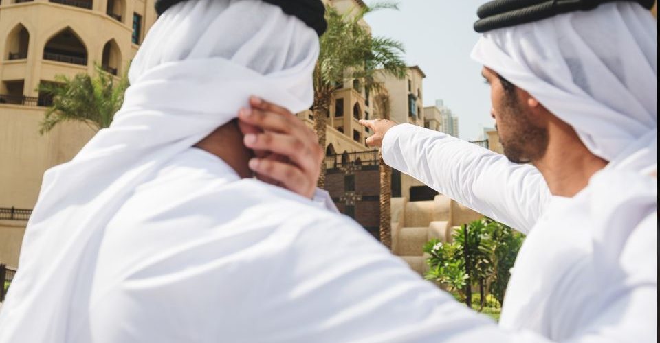 Two Men in UAE discussing the Real Estate