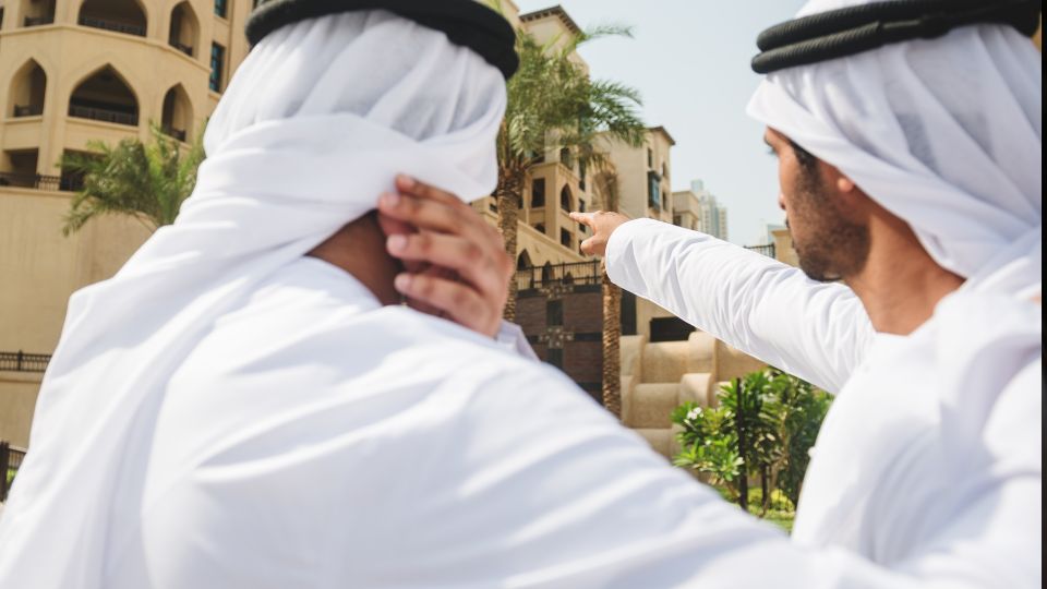 Two Men in UAE discussing the Real Estate